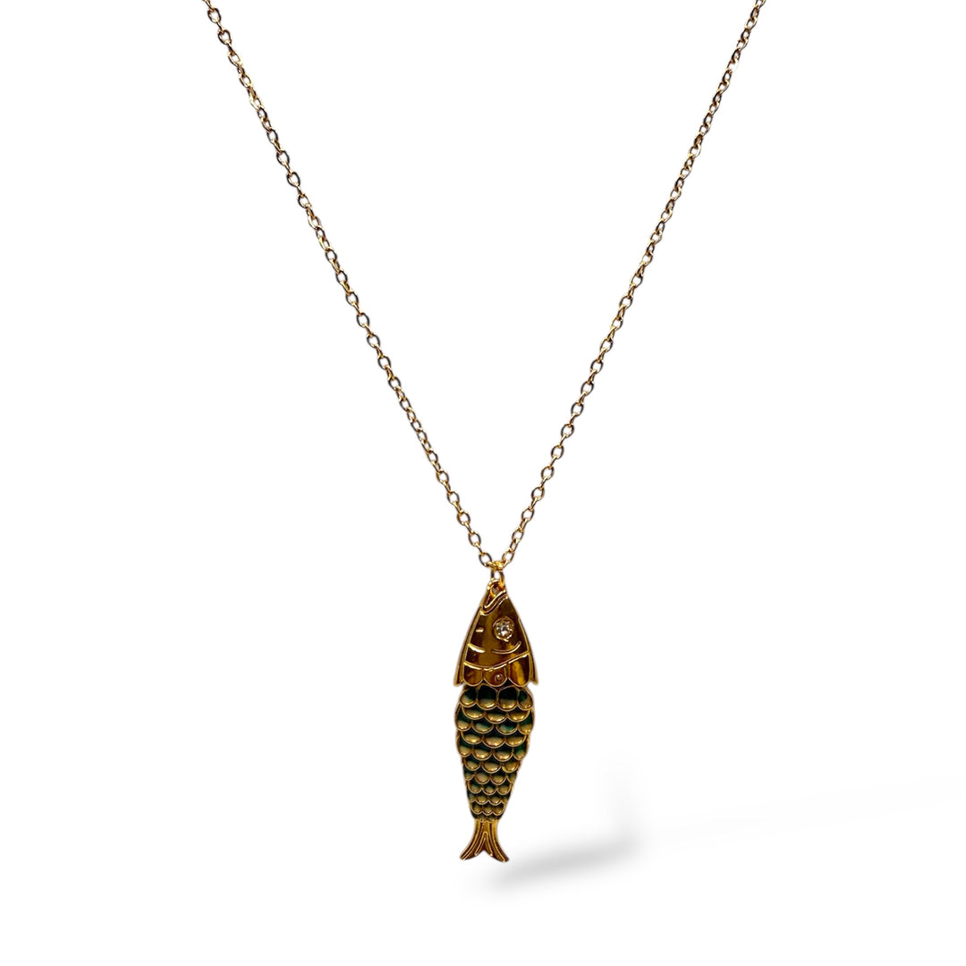 Gold fish-shaped pendant on a chain against a white background