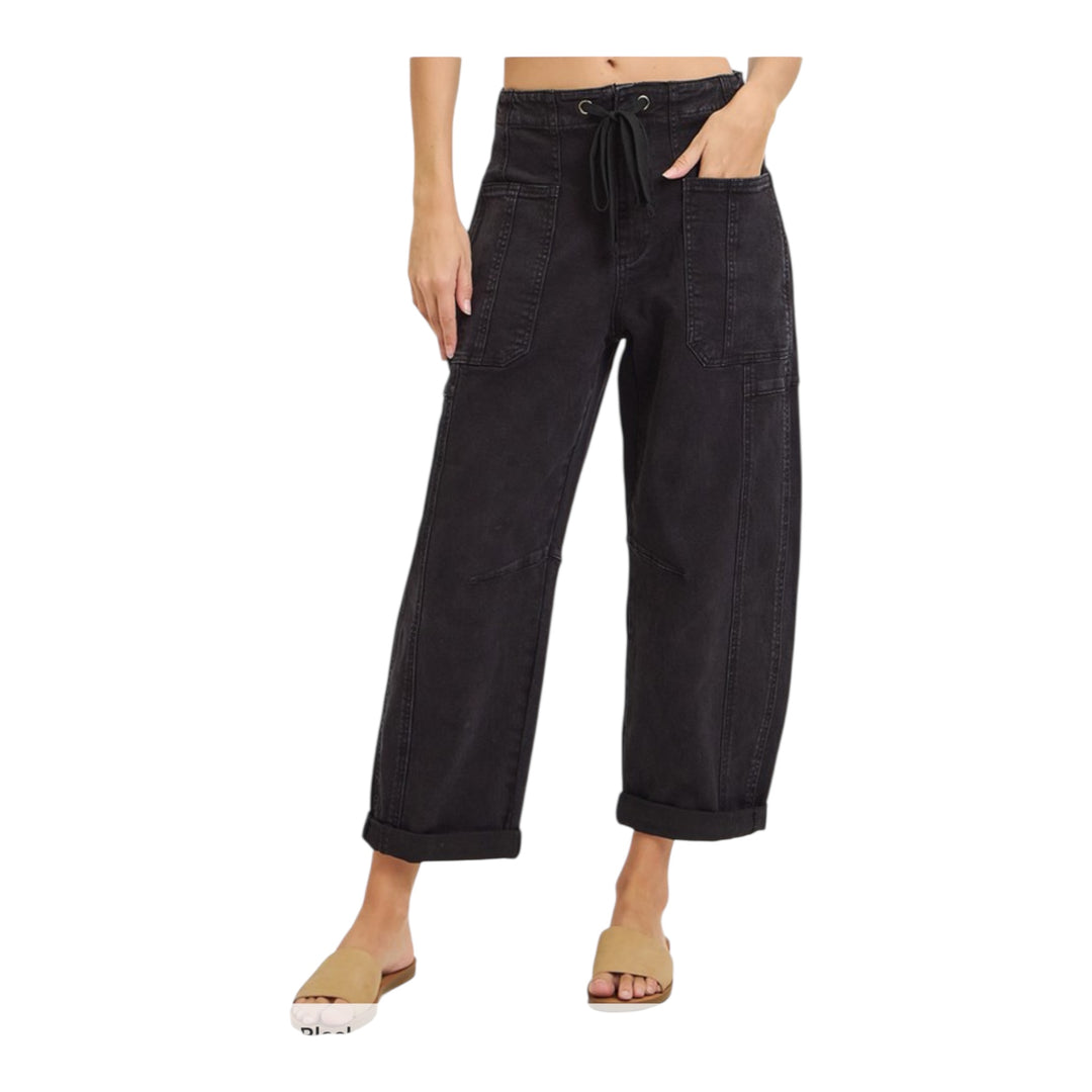 Black wide-leg pants worn by a person on a white background