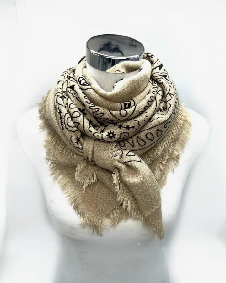 vory bandana print fringe scarf styled on mannequin.
Beige bandana print oversized fringe scarf styled on mannequin.
Olive bandana print oversized fringe scarf styled on mannequin.