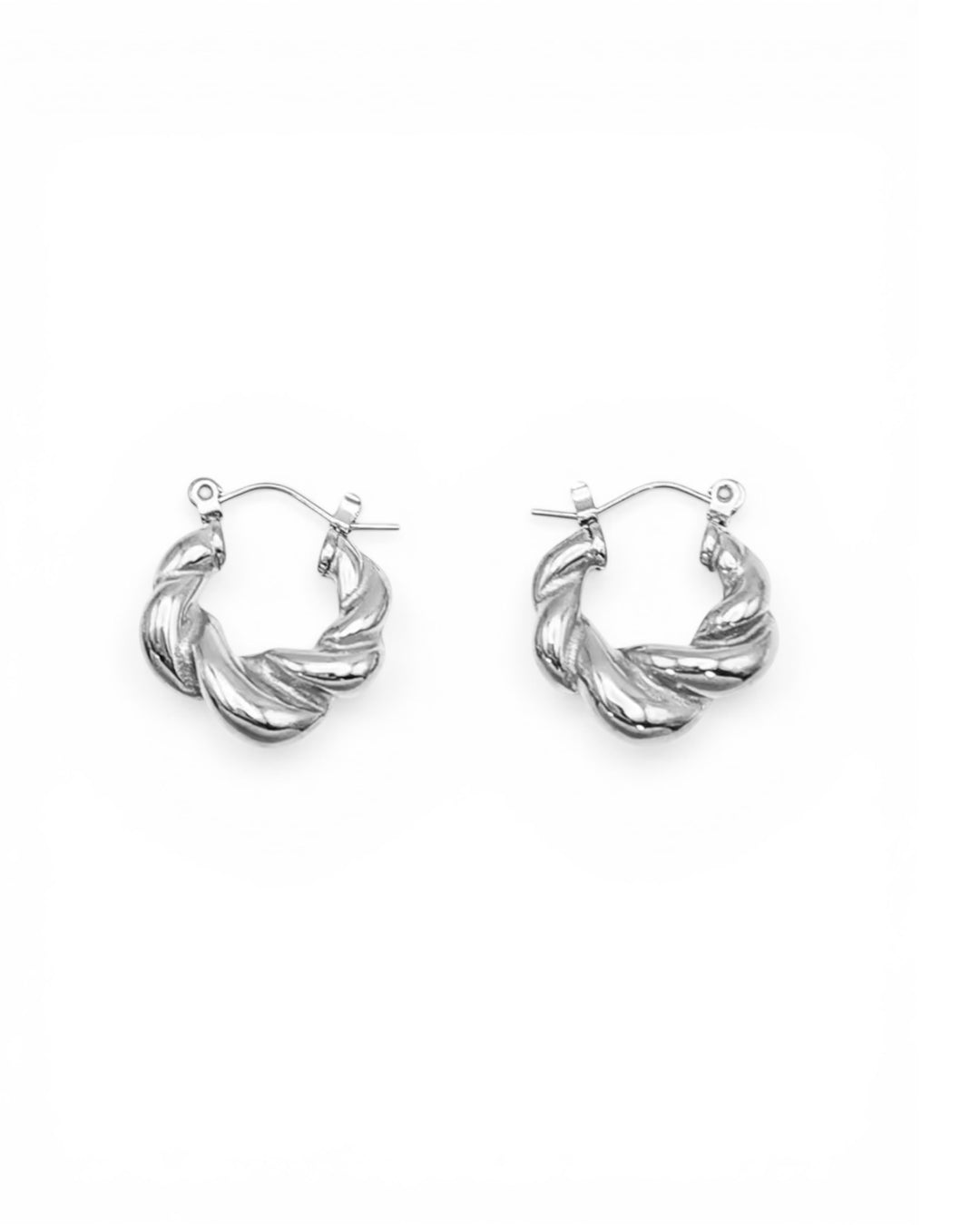 Silver hoop earrings on a white background