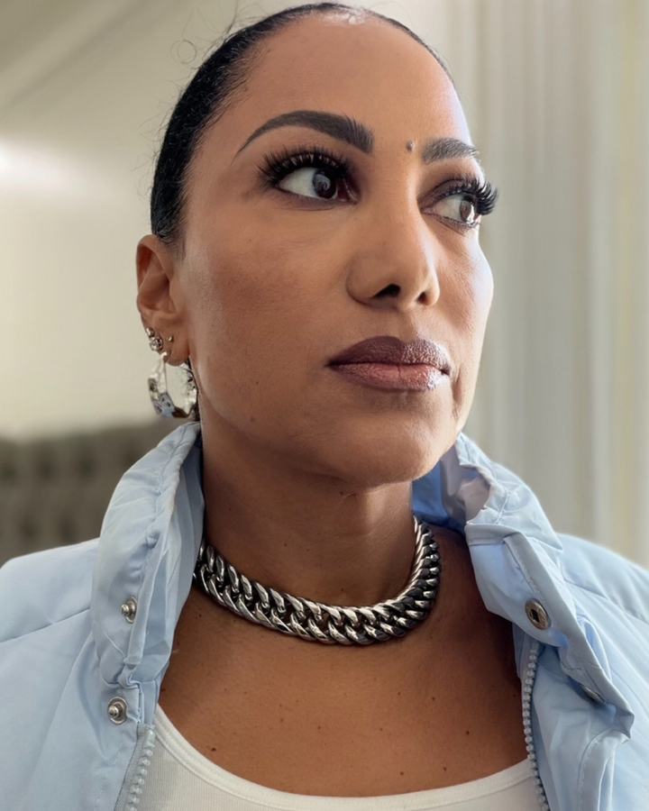 Bold silver Cuban-style chain choker necklace crafted from stainless steel with rhodium plating and a high-shine finish.